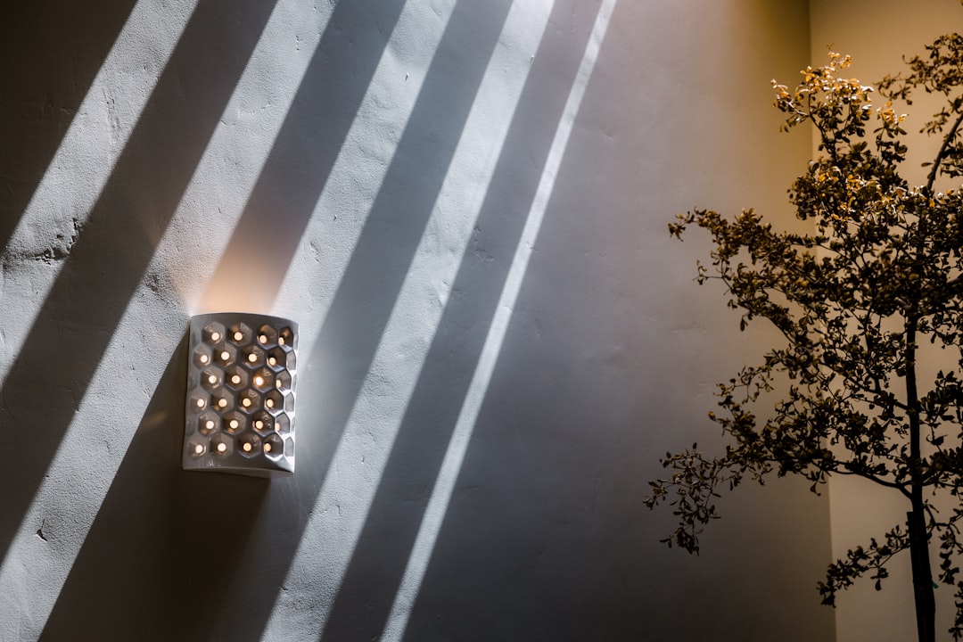 Photo handmade clay wall sconce